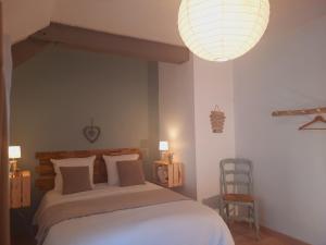 Postel nebo postele na pokoji v ubytování Le clos des sources