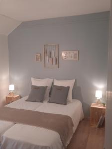 Кровать или кровати в номере Le clos des sources