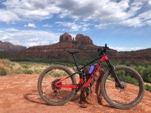 a bike parked on a dirt road in the desert at Sedona Studio at Thunder Mountain in Sedona