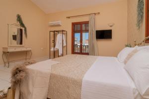Postel nebo postele na pokoji v ubytování Sea Elegance Villa