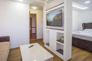 Postelja oz. postelje v sobi nastanitve Hotel Pavlović