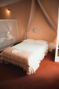 Postel nebo postele na pokoji v ubytování Villa Olympia