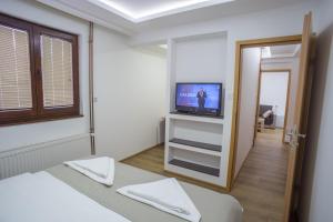 Postelja oz. postelje v sobi nastanitve Hotel Pavlović