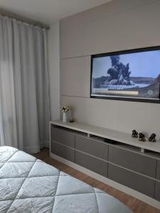 TV a/nebo společenská místnost v ubytování GRAMADO TOP CENTRO