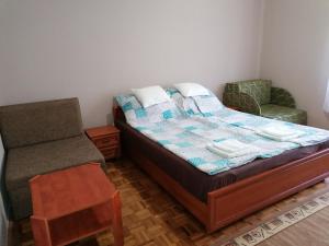 Postel nebo postele na pokoji v ubytování Gulyás Vendégház