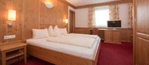 Postel nebo postele na pokoji v ubytování Hotel Brunnwirt