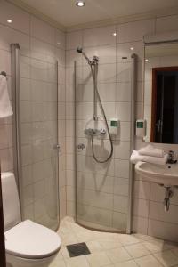 Koupelna v ubytování Alver Hotel