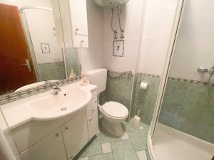 Kúpeľňa v ubytovaní Apartmani Dea