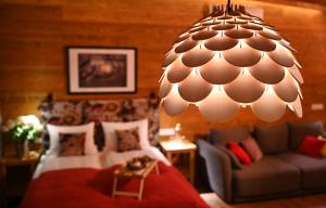 Posedenie v ubytovaní Apartamenty u Harrego BOUTIQUE SPA z klimatyzacja, balkon, sauna, tężnia parking