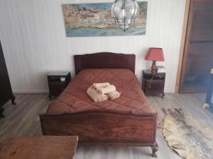 Un pat sau paturi într-o cameră la Casa S. Nicolau