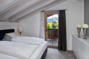 Katil atau katil-katil dalam bilik di Hotel Mischun