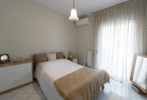 Llit o llits en una habitació de Vanilla Luxurious Apartment