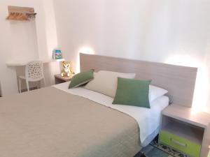 Postel nebo postele na pokoji v ubytování B&By in viaggio