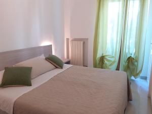 Postel nebo postele na pokoji v ubytování B&By in viaggio