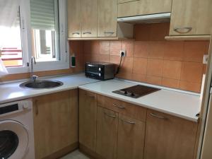 Kuchyňa alebo kuchynka v ubytovaní Apartamento Beach