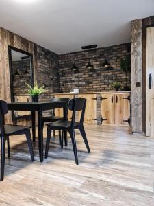 Fotografia z galérie ubytovania Apartamenty Góralski DACH NAD GŁOWĄ v destinácii Poronin