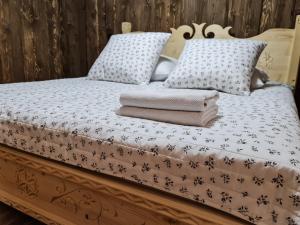 Posteľ alebo postele v izbe v ubytovaní Apartamenty Góralski DACH NAD GŁOWĄ