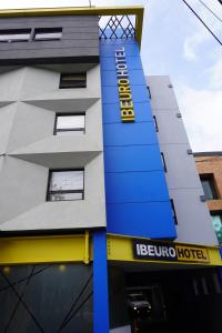 a building with a hotel sign on the side of it at Ibeurohotel Guadalajara Expo in Guadalajara