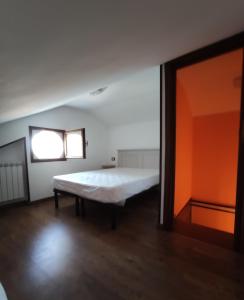 a bedroom with a bed and a window in it at DA ELENA in Castel di Sangro