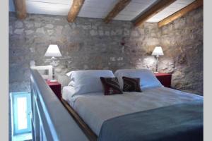 Cama o camas de una habitación en Critamo cottage