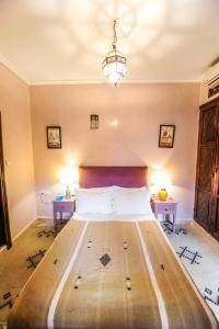 Voodi või voodid majutusasutuse Riad Errabii & Spa toas