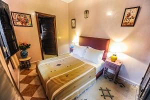 Voodi või voodid majutusasutuse Riad Errabii & Spa toas
