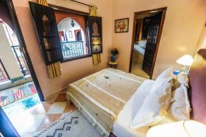 Voodi või voodid majutusasutuse Riad Errabii & Spa toas