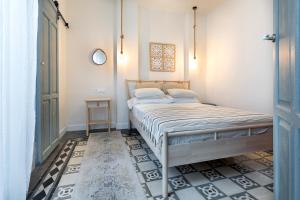 Кровать или кровати в номере Apartamentos PROGRESO