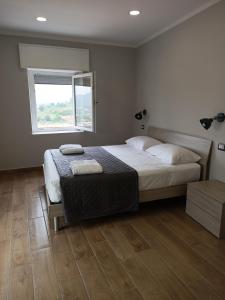Posteľ alebo postele v izbe v ubytovaní La finestra sul colle