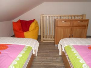 Posteľ alebo postele v izbe v ubytovaní TATRYSTAY Apartmány Lomnica + 11 fotografií