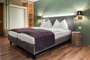 Postel nebo postele na pokoji v ubytování Hotel Bären