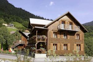 a large house with a balcony on the side of it at Haus Sonnbühel in Brand
