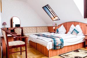 Säng eller sängar i ett rum på Beatrix Hotel