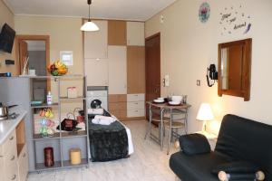 TV a/nebo společenská místnost v ubytování Serenity LX Apartments