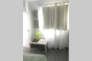 Posteľ alebo postele v izbe v ubytovaní Ático con vistas y Gran terraza
