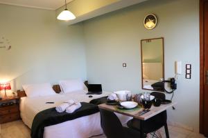 Postel nebo postele na pokoji v ubytování Serenity LX Apartments