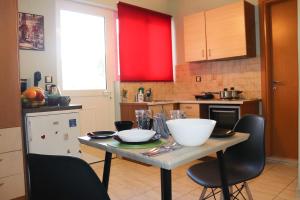 Kuchyň nebo kuchyňský kout v ubytování Serenity LX Apartments