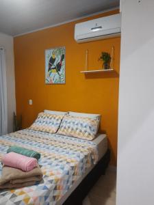 Postelja oz. postelje v sobi nastanitve Pousada Canto Dos Passaros