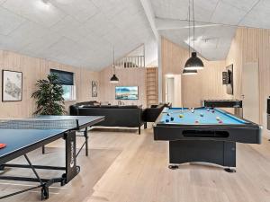a billiard room with two ping pong tables at Holiday home Kappeln XXIV in Kappeln