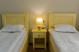 Letto o letti in una camera di Mebo House