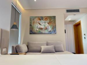 Postel nebo postele na pokoji v ubytování NOI HOTEL
