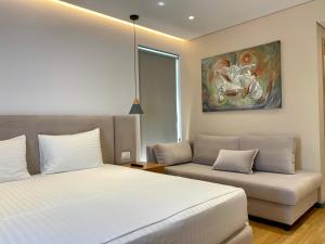 Postel nebo postele na pokoji v ubytování NOI HOTEL + 37 fotografií