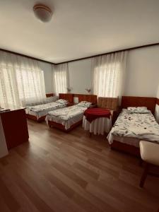 Postel nebo postele na pokoji v ubytování Hotel Ambient - Struga
