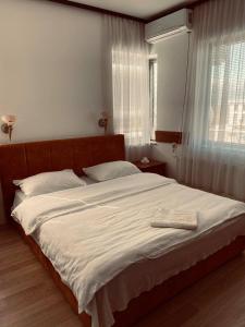 Postel nebo postele na pokoji v ubytování Hotel Ambient - Struga