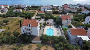 Bazén v ubytování Apartments Villa Olga nebo v jeho okolí