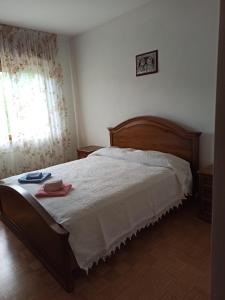 Postel nebo postele na pokoji v ubytování Casa della Nonna