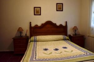 A bed or beds in a room at El Molino de la laguna Még 37 kép