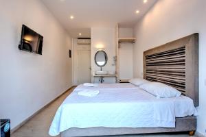 Letto o letti in una camera di Anamar Santorini