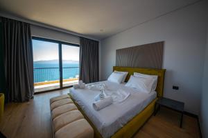 Кровать или кровати в номере Apart-Hotel Lili2