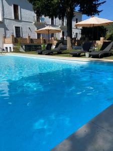 Bazén v ubytování HOTEL LUZ ALMONASTER nebo v jeho okolí